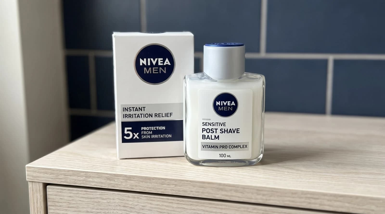Nivea Men Sensitive Post Shave Balm 100ml on an ash-wood cabinet