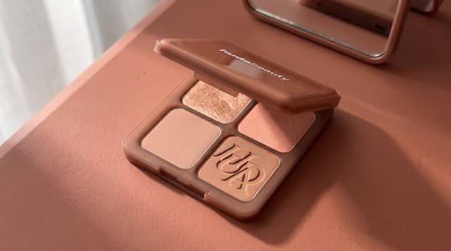 Huda Beauty Bronze Filter Palette in Light. AI editorial illustration based on the official product photograph.