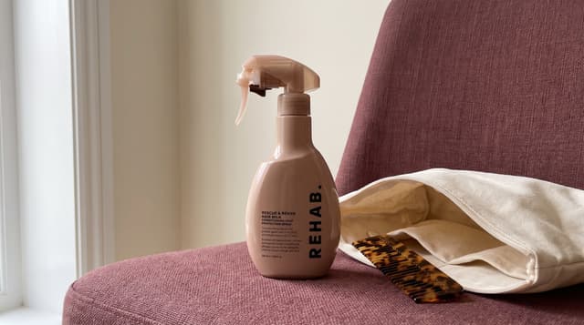 REHAB Rescue & Revive Hair Milk, 290 mL. AI editorial illustration based on official packaging.